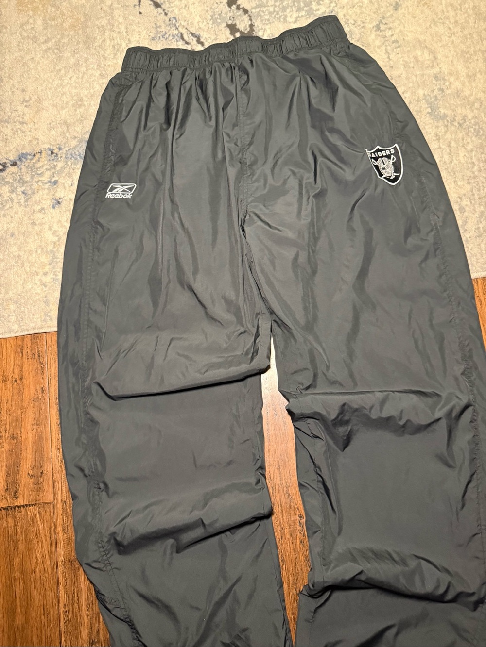 Vintage Reebok Oakland Raiders NFL Black Windbreaker Track Pants